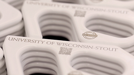 The Made at UW-Stout door pullers will help students open doors on campus without touching the handles during the pandemic.