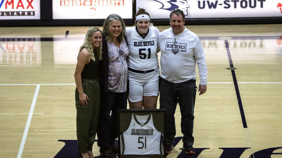 Erin O'Brien, Senior's Night, with her parents and Coach Hannah Iverson