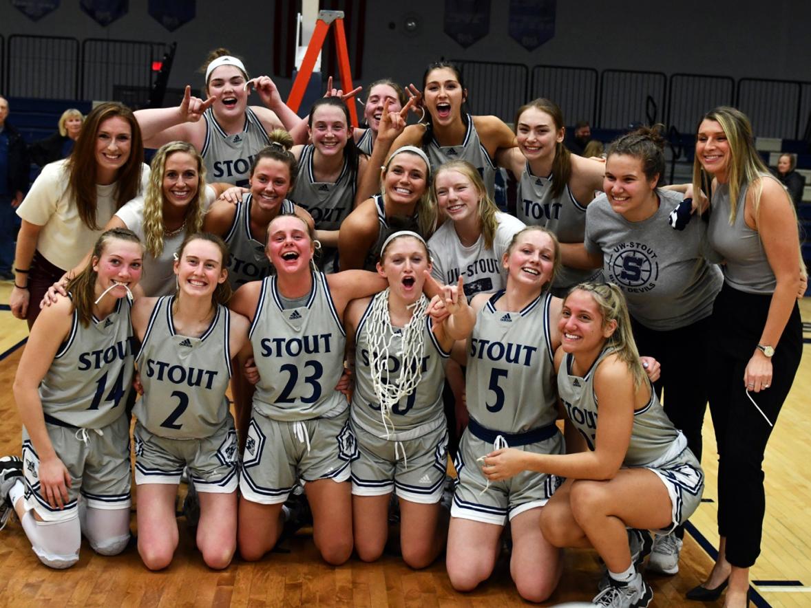 The Blue Devils celebrate their win Feb. 15 over UW-Eau Claire to earn a share of the WIAC championship.