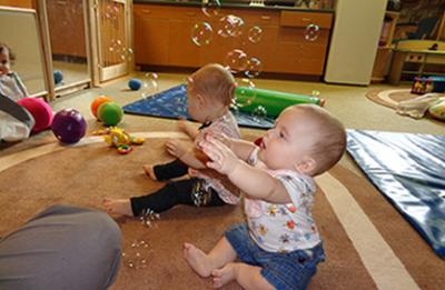 Infant with bubbles in the Child and Family Study Center
