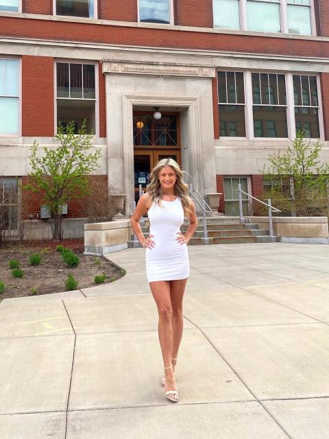 Olivia Johnston, outside Harvey Hall, graduates May 8 with a degree in business administration.